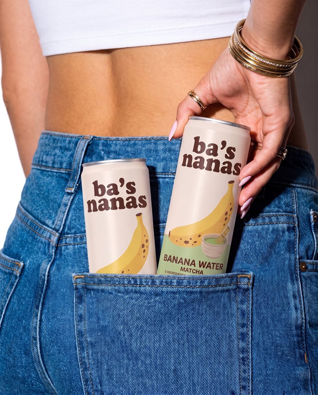 Two cans in a back jeans pocket