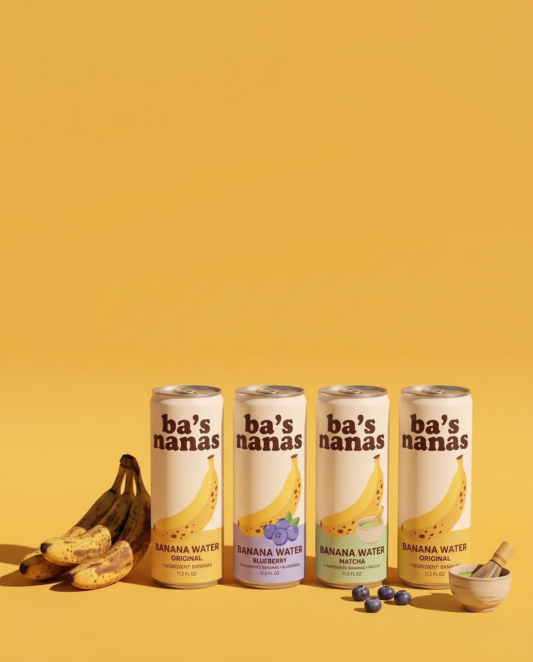 Original, Blueberry and Matcha cans lined up on yellow